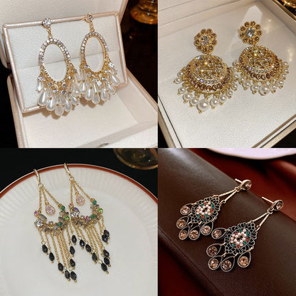 Vintage high-end silver needle ethnic style diamond inlaid flower earrings with exaggerated European and American temperament earrings pendant light luxury niche earrings