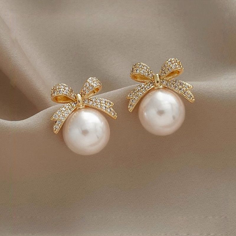 New Bow Pearl Female Earrings Light Luxury Senior Earrings Retro Rashion Diamond Earrings Personalised Design Silver Pin Earrings