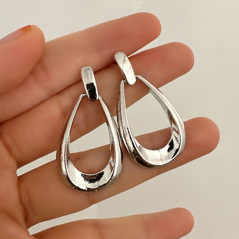 Europe and the United States new earrings light luxury high sense hollow drop ins geometric oval earrings for women drop earrings