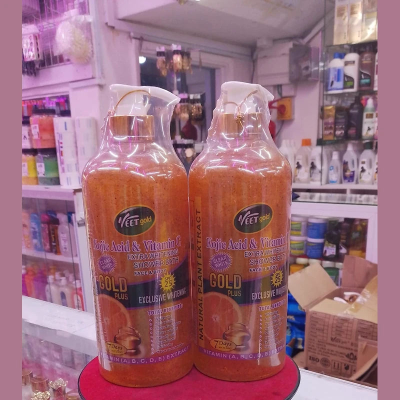 Two bottles of Veet Gold Kojic Acid & Vitamin C Shower Bath – Brightening Cleanse