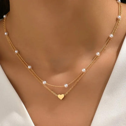 Hot selling imitation pearl heart pendant necklace versatile clavicle necklace female retro double layer necklace