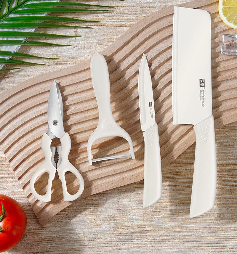 Four piece set of kitchen knives, milk and cabbage knives, internet famous and popular kitchen knives, slicing knives, fruit knives, peeling knives, scissors combination set