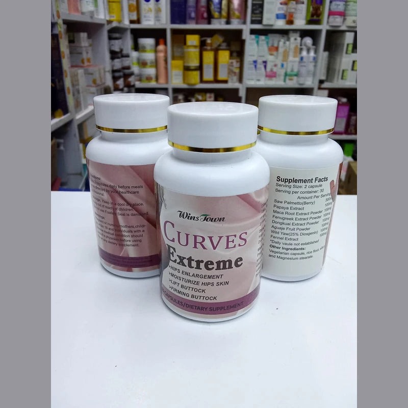 Three 'Curves Extreme' supplement bottles on a white surface with a store shelf in the background.