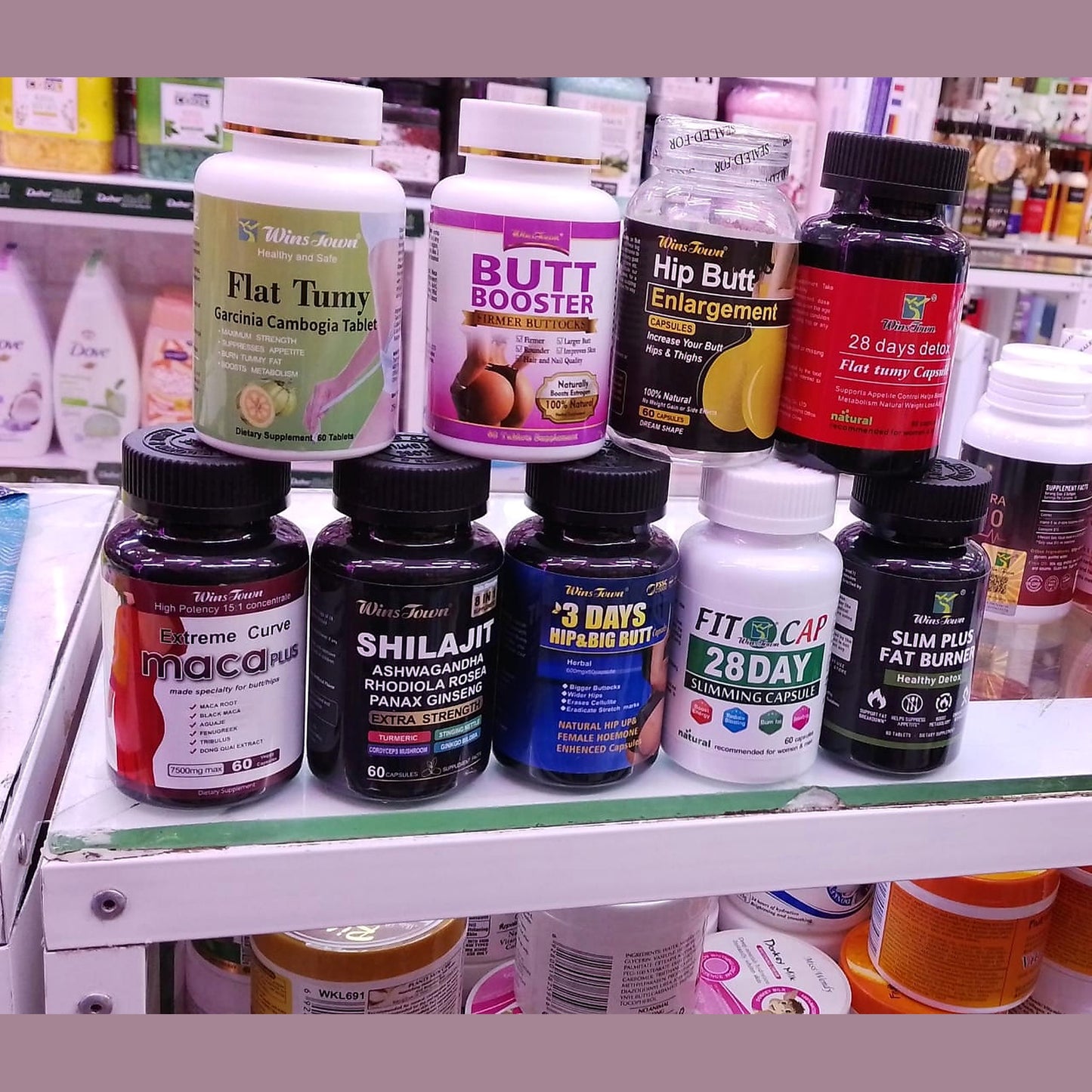 Assorted health and fitness supplements on a store shelf