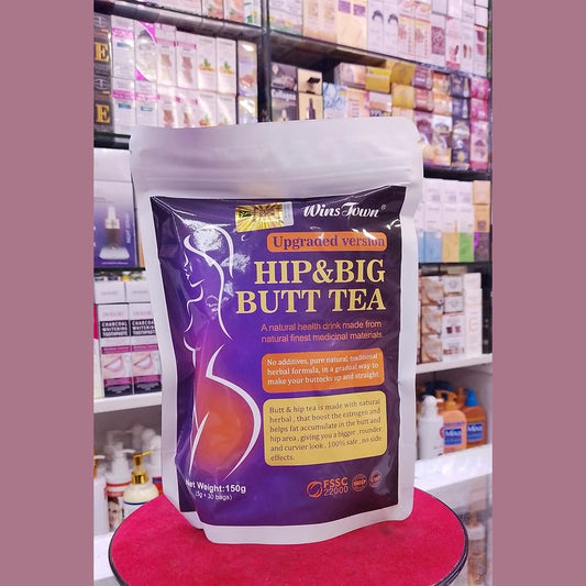 Package of 'Hip & Big Butt Tea' on a red stand with a store shelf in the background