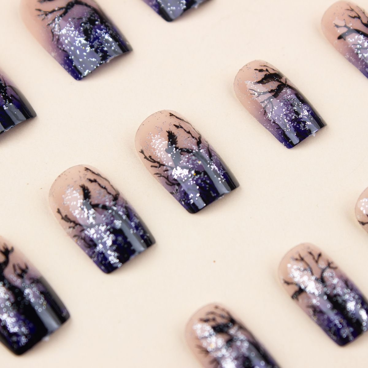 Medium to long square wearing nail, black withered tree silhouette nail art, light blue gradient fake nail glitter, detachable nail patch
