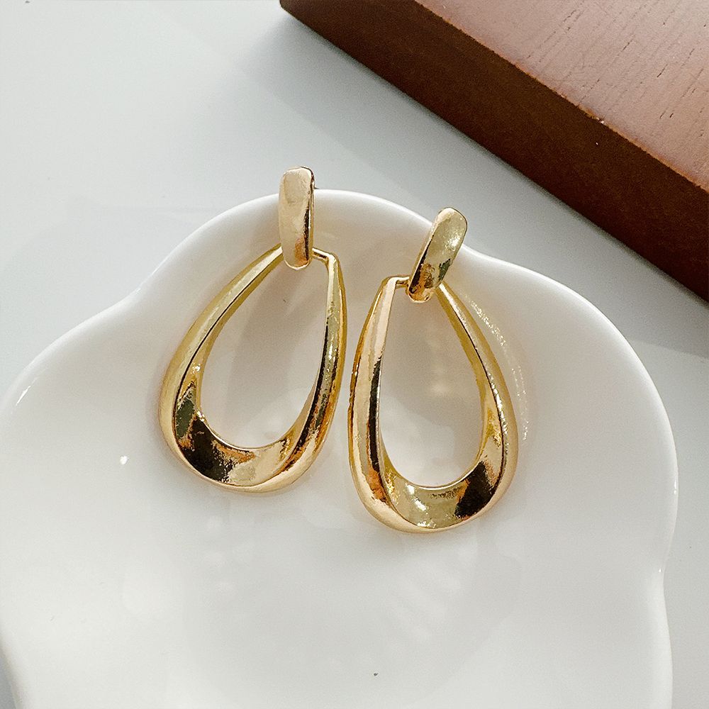 Europe and the United States new earrings light luxury high sense hollow drop ins geometric oval earrings for women drop earrings